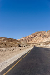 Fototapeta na wymiar Lonely road in the desert