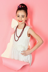 Child girl in stylish glamour elegant dress. Retro girl or fashion model, beauty. Fashion and beauty, pinup style, childhood. Retro look, hairdresser, makeup. Little girl in vintage dress, prom