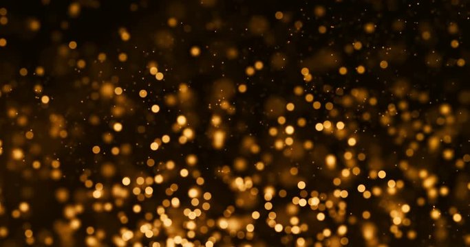 christmas gold gradient sparkle glitter dust particles from top on black background with bokeh flowing movement, golden holiday happy new year and valentine day love, relationship concept