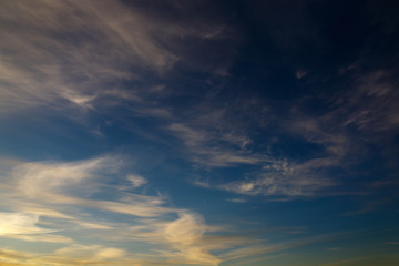 Bright clouds in the twilight sky.