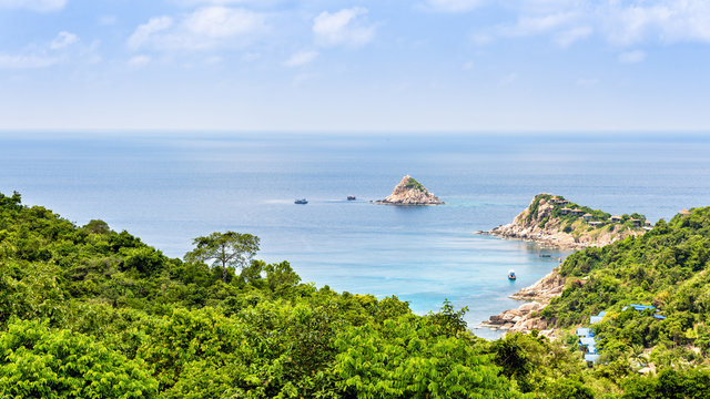 Beautiful nature landscape blue sea at Aow leuk bay under the summer sky from high scenic view point on Koh Tao island is a famous tourist attraction in Surat Thani, Thailand, 16:9 widescreen