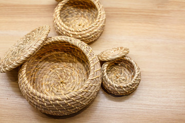 wicker baskets of bamboo are on the table