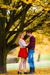 Fototapeta premium Young couple meet in park on date.