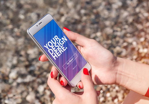 Hands Holding Smartphone in a Natural Landscape Mockup