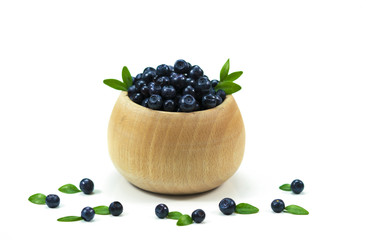 Blueberries in bowl isolated on white background