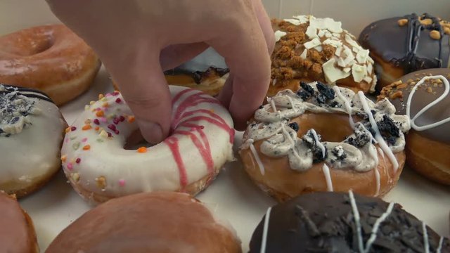 Donut Box Opens And Person Takes One