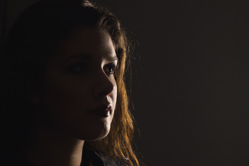 Atmospheric silhouette of young girl 