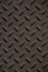 Grunge Wallpaper Industrial Checker Plate Background Texture with Worn Rusty Diamond Tread Pattern