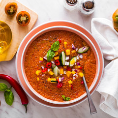 raw fresh refreshing soup of red vegetables and olive oil with o
