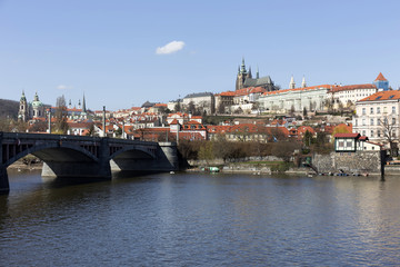 Fototapeta na wymiar Spring Prague gothic Castle with the Lesser Town above River Vltava in the sunny Day, Czech Republic