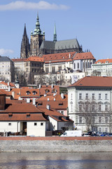 Spring Prague gothic Castle with the Lesser Town above River Vltava in the sunny Day, Czech Republic
