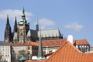 Fototapeta premium Spring Prague gothic Castle with the Lesser Town above River Vltava in the sunny Day, Czech Republic