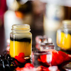 creepy halloween party cocktails with blood, spiders and ice cubes