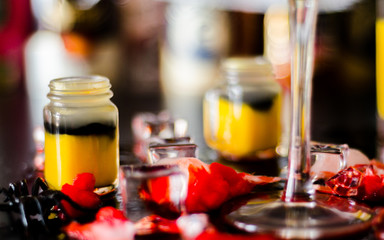 creepy halloween party cocktails with blood, spiders and ice cubes