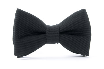 A black pre-tied bow tie with matching cuff links
