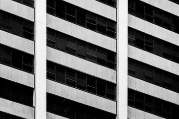 Modern office building detail, glass surface with B&W color