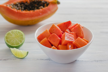 papaya fruit with chili, mexican snack, spicy food mexico