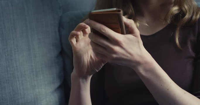 Young woman using her smartphone