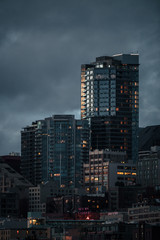 Naklejka premium Tall Buildings In Seattle During A Cloudy Sunset