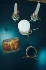 Religious rite: communion. candles, wine, bread. Top view