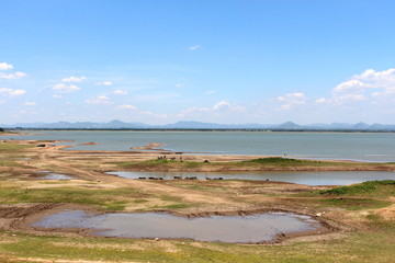 Fototapeta na wymiar Landscape of Pa Sak Jolasid dam has little water (View from the train), Lop Buri Province, Thailand