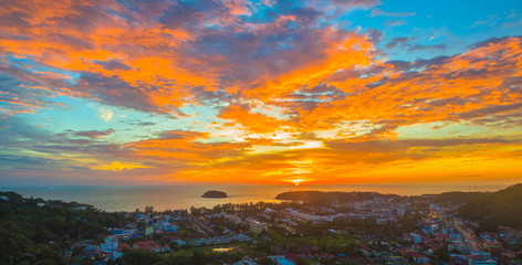 Fototapeta na wymiar panorama scenery sunset in Andaman sea. small Pu island in the middle of Kata beach and Karon beach.