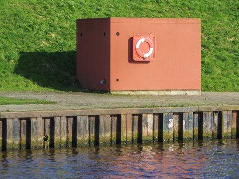 Container with container for lifebuoy