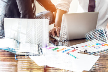 Financial Manager In talks with employees in the company, Goal of the Firm,Double exposure business,laptop Put on a wooden table made with vintage tones,The media 