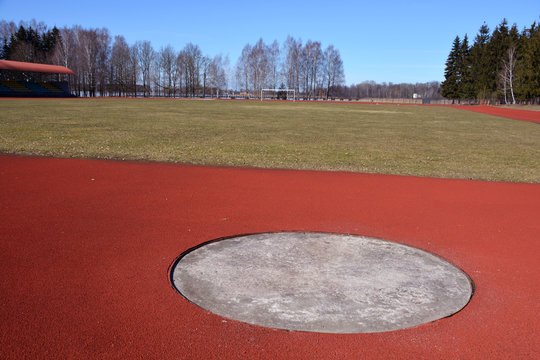 Empty sector of discus throwers in province stadium