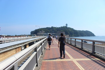 Fujisawa, Japan - JULY 7, 2017: Walk from Enoshima Train Station to Enoshima Shrine
