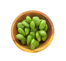 A wooden bowl of Stink Bean, also called Parkia speciosa, Bitter bean, isolated on white background, top view