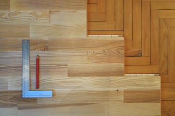 An image of an old parquet and a new parquet board.