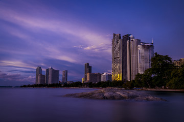 Fototapeta premium Exposure colorful at twilight time of building at pattaya beach with twilight background