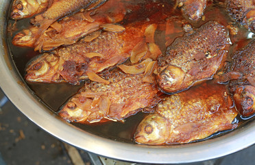 Sweet and sour boiled thai carp fish.