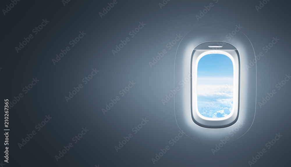 Wall mural airplane window with copy space