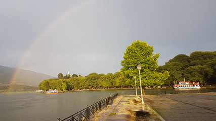 rainbow in Ioannina lake Pamvotis after summer rain Greece
