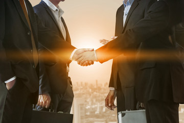 Double exposure Business People Handshake Meeting
