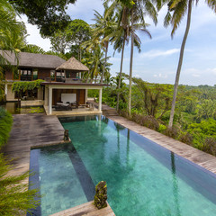 Relaxing area at infinity swimming pool in tropical island Bali, Indonesia © OlegD