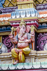 Hindu God Ganesha statue in temple, island Mauritius, close up