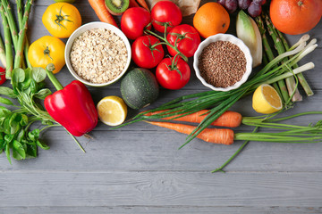 Various healthy products on wooden background