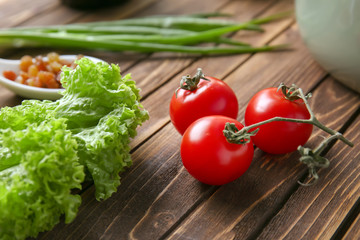 Fresh vegetables on wooden table