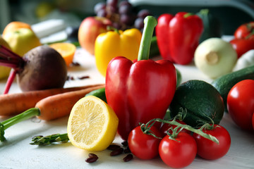 Fresh vegetables and fruits on wooden table