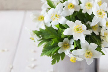 Naklejka na ściany i meble Bunch of spring flowers in iron mug