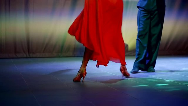 two professional dancers on the stage of ballroom dancing performances