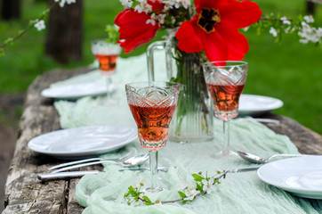 Beautiful backdrop - a festive table in the garden