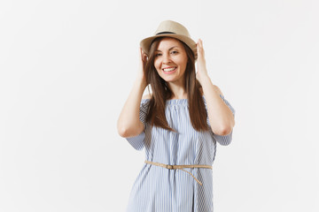Fototapeta premium Young tender elegant charming woman dressed blue dress, cute hat with long brunette hair posing isolated on white background. People, sincere emotions, lifestyle concept. Advertising area. Copy space.