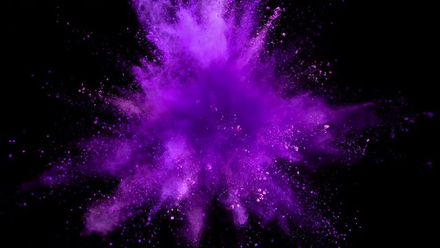 Super slow motion of coloured powder explosion isolated on black background. Filmed on high speed cinema camera, 1000fps.
