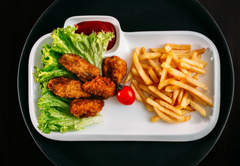 European international fusion cuisine, a beautiful dish on a white plate decorated with herbs and vegetables. a professional chef has prepared a delicious meal.