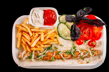 European international fusion cuisine, a beautiful dish on a white plate decorated with herbs and...