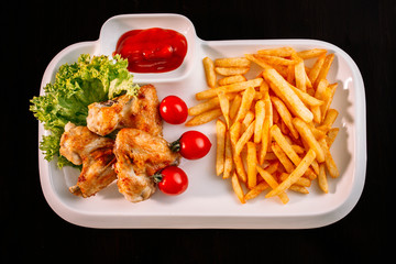 European international fusion cuisine, a beautiful dish on a white plate decorated with herbs and vegetables. a professional chef has prepared a delicious meal.